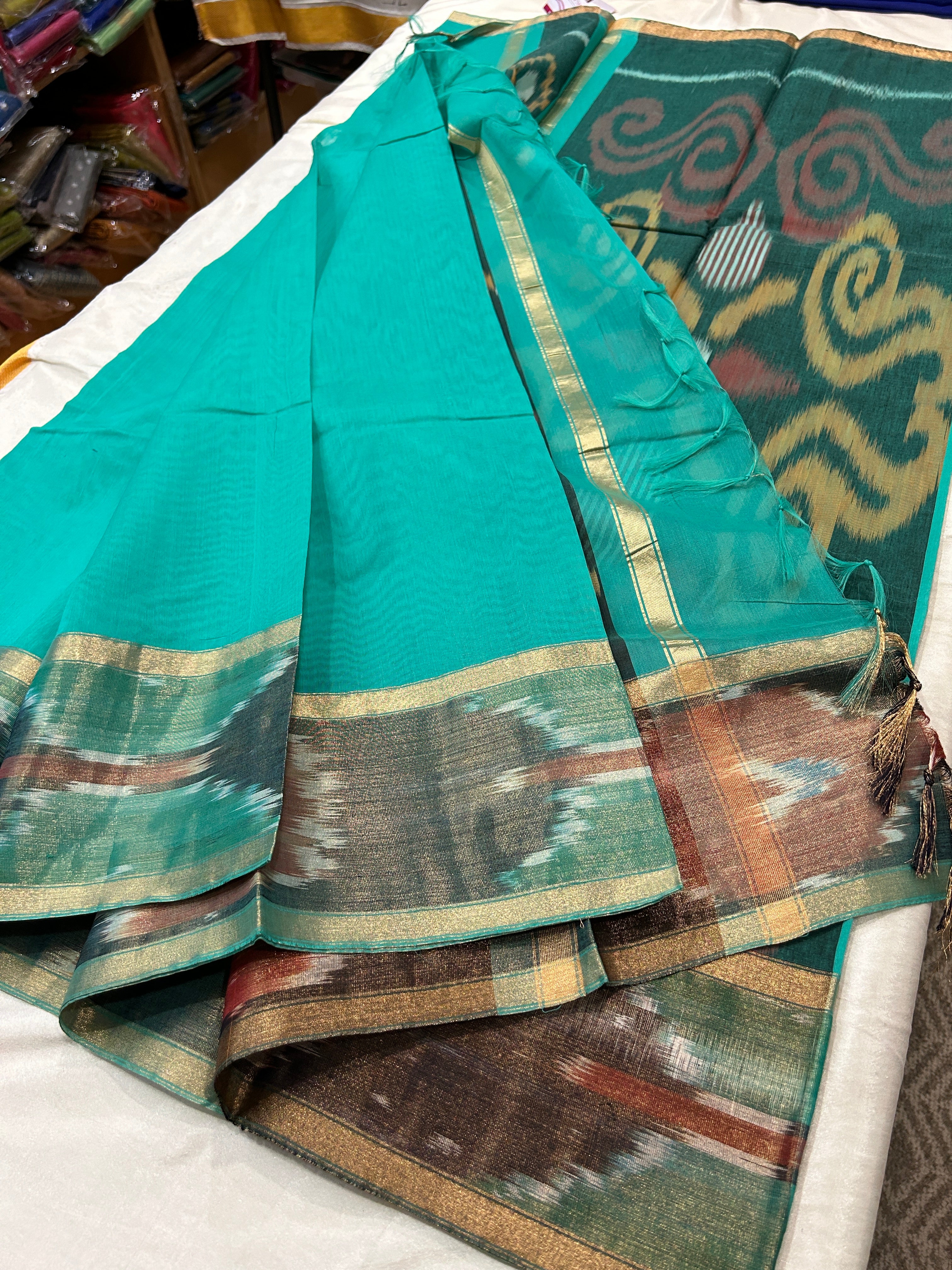 Ikkat zari border cotton silk saree with rich pallu & running blouse