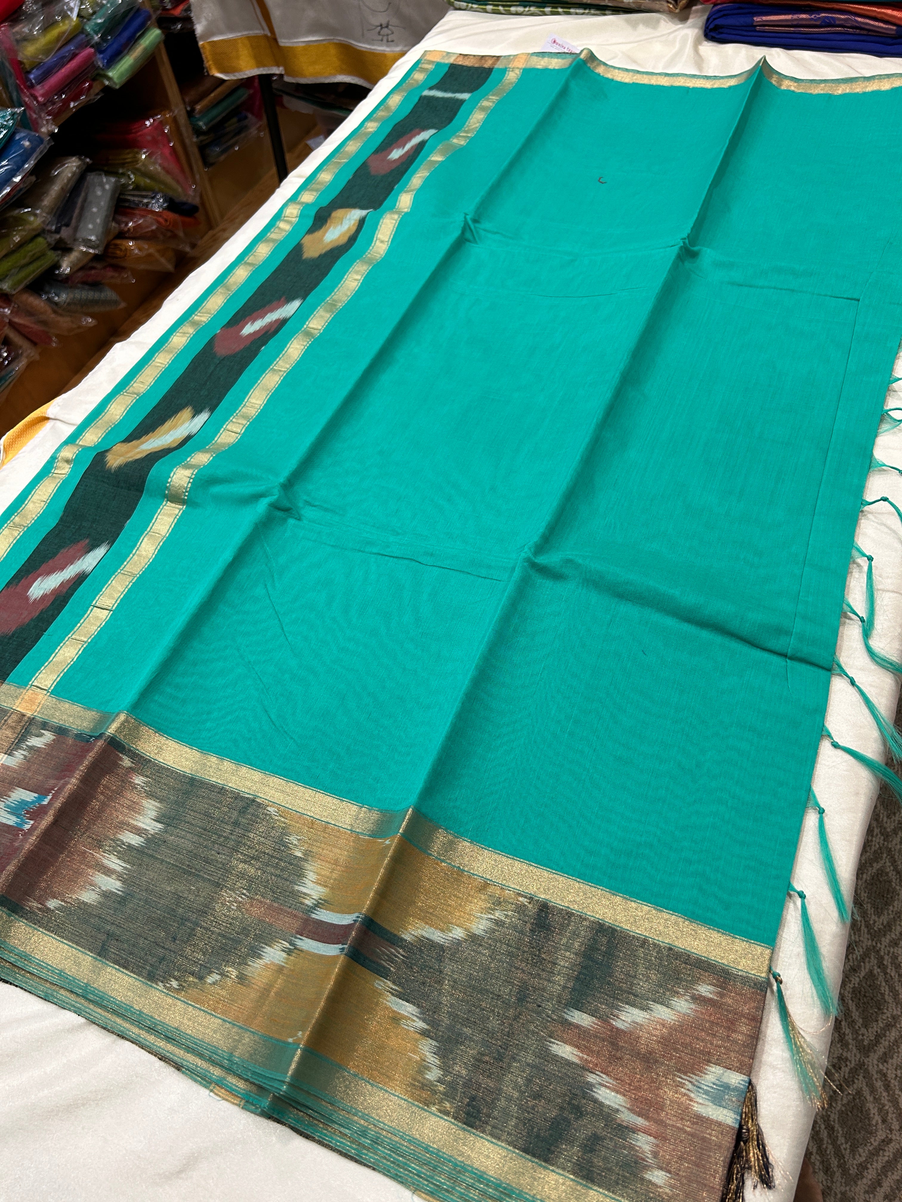 Ikkat zari border cotton silk saree with rich pallu & running blouse